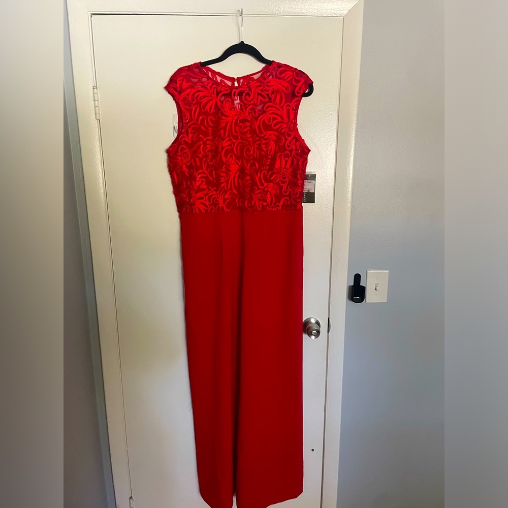 Red jump suit.
